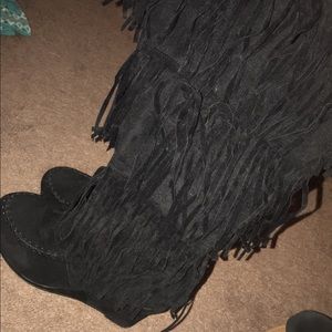 Black fringed heeled boots
